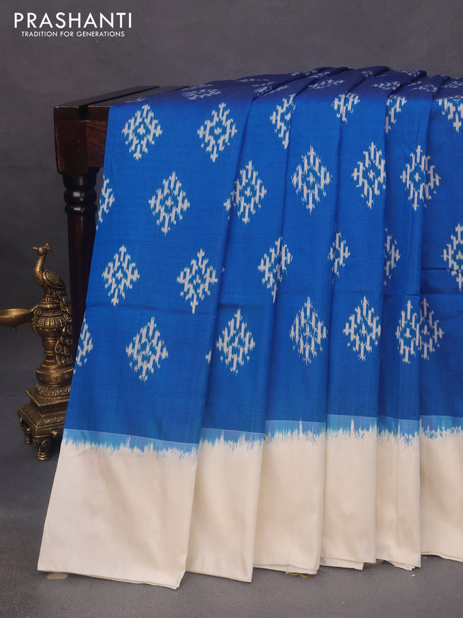 Pochampally silk saree cs blue and off white with ikat butta weaves and simple border