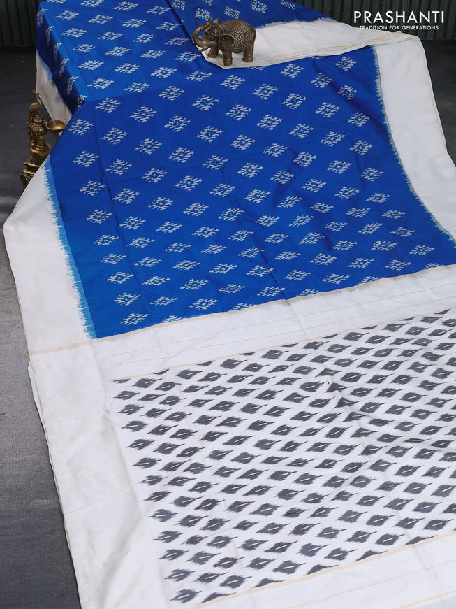 Pochampally silk saree cs blue and off white with ikat butta weaves and simple border