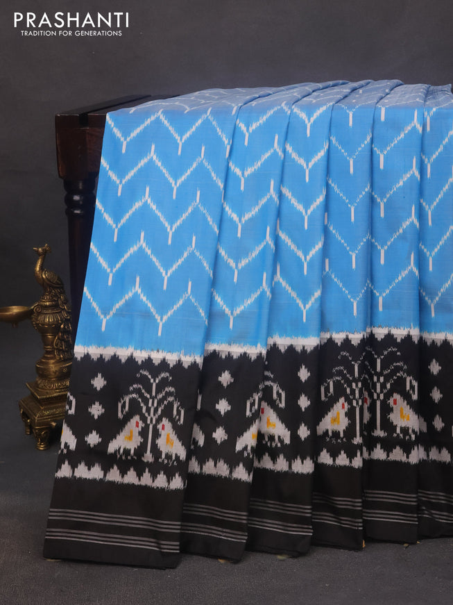 Pochampally silk saree cs blue and black with allover ikat weaves and long ikat woven border