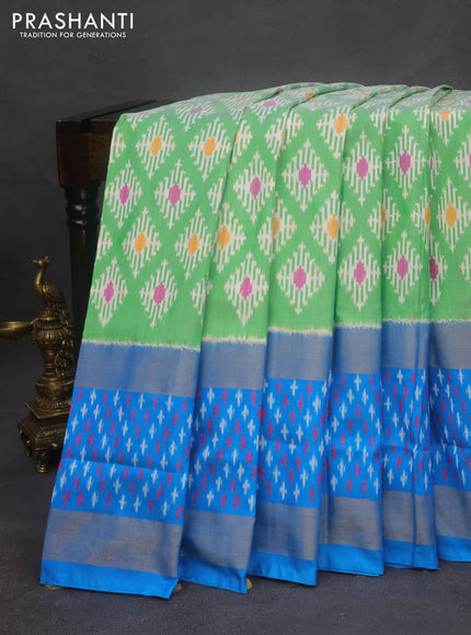 Pochampally silk saree light green and cs blue with allover ikat butta weaves and rettapet zari woven ikat style border