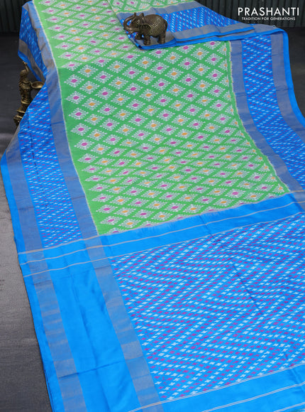 Pochampally silk saree light green and cs blue with allover ikat butta weaves and rettapet zari woven ikat style border