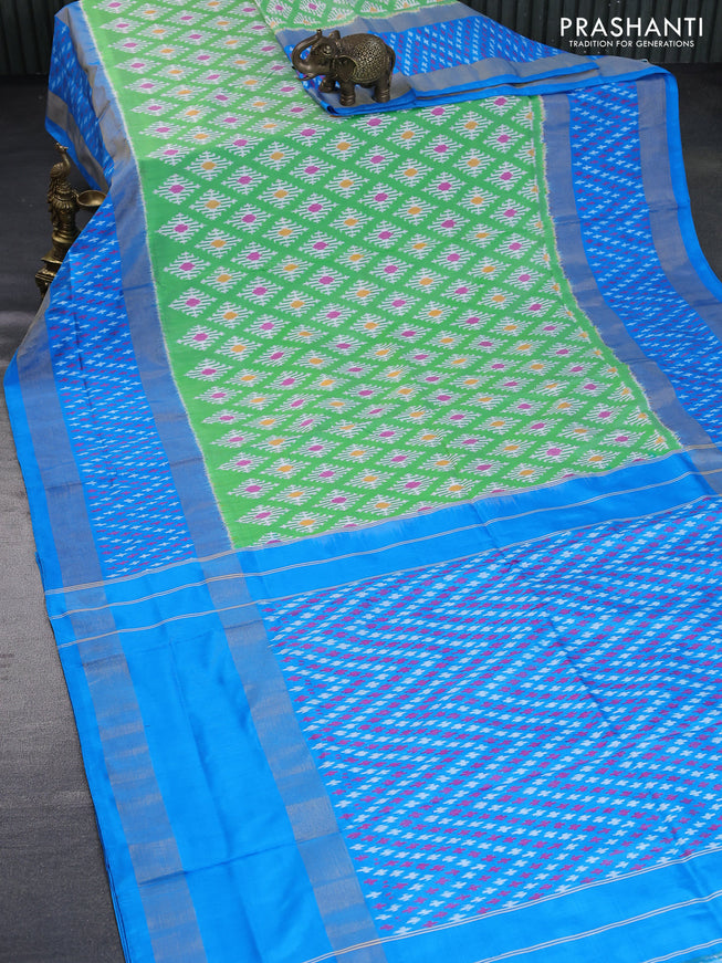 Pochampally silk saree light green and cs blue with allover ikat butta weaves and rettapet zari woven ikat style border