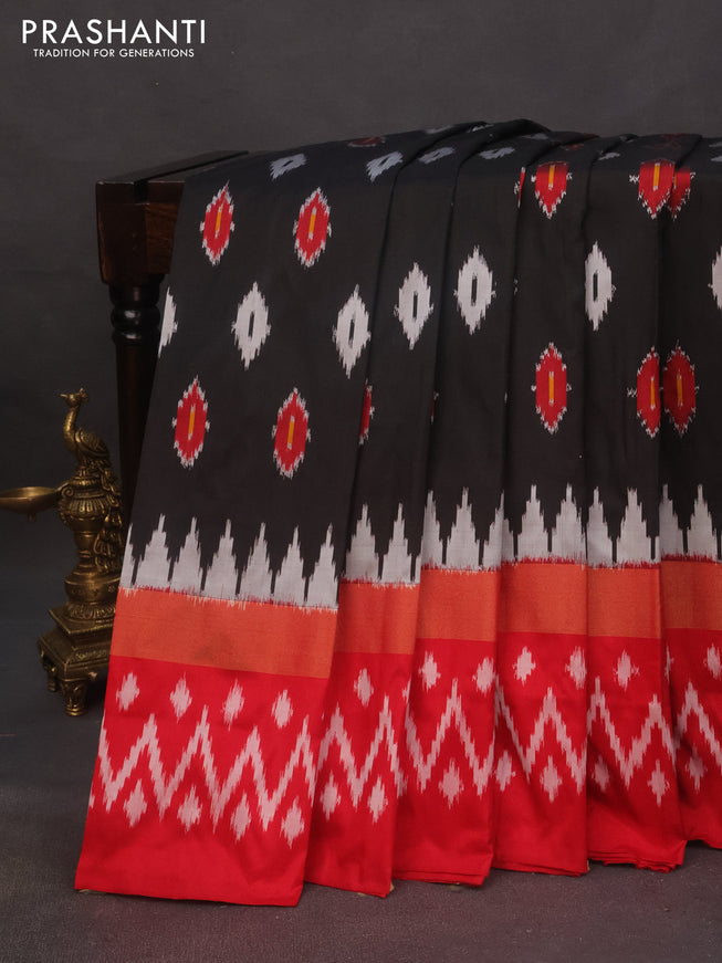 Pochampally silk saree black and red with allover ikat butta weaves and zari woven ikat style border