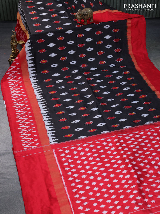 Pochampally silk saree black and red with allover ikat butta weaves and zari woven ikat style border