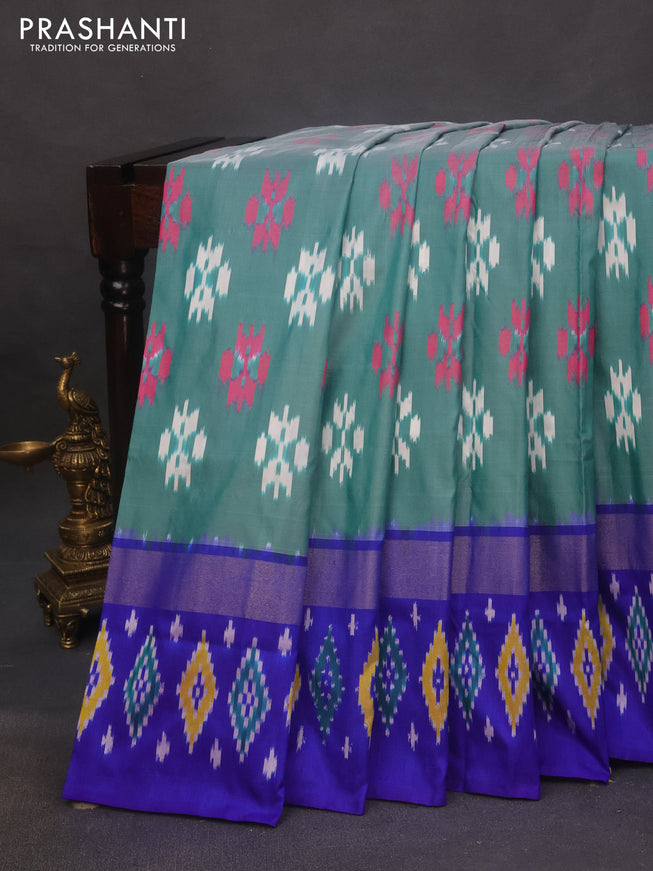 Pochampally silk saree green shade and blue with allover ikat butta weaves and zari woven ikat style border