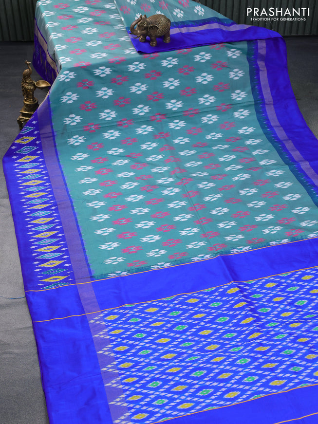 Pochampally silk saree green shade and blue with allover ikat butta weaves and zari woven ikat style border