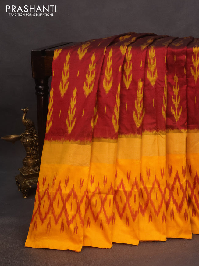 Pochampally silk saree maroon and mango yellow with allover ikat butta weaves and zari woven ikat style border