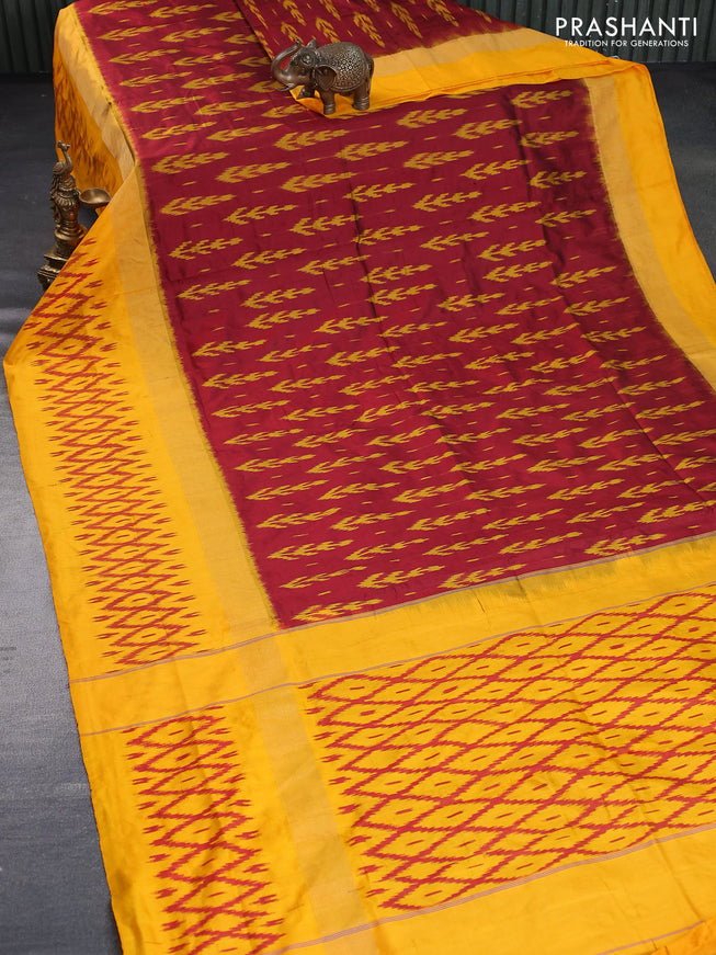 Pochampally silk saree maroon and mango yellow with allover ikat butta weaves and zari woven ikat style border