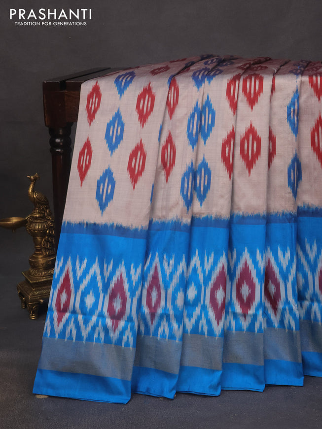 Pochampally silk saree grey and cs blue with allover ikat butta weaves and ikat woven zari border