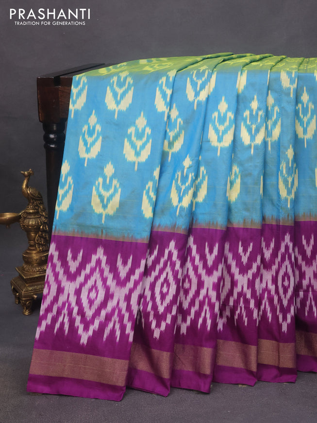 Pochampally silk saree dual shade of cs blue and deep purple with allover ikat butta weaves and long ikat woven zari border