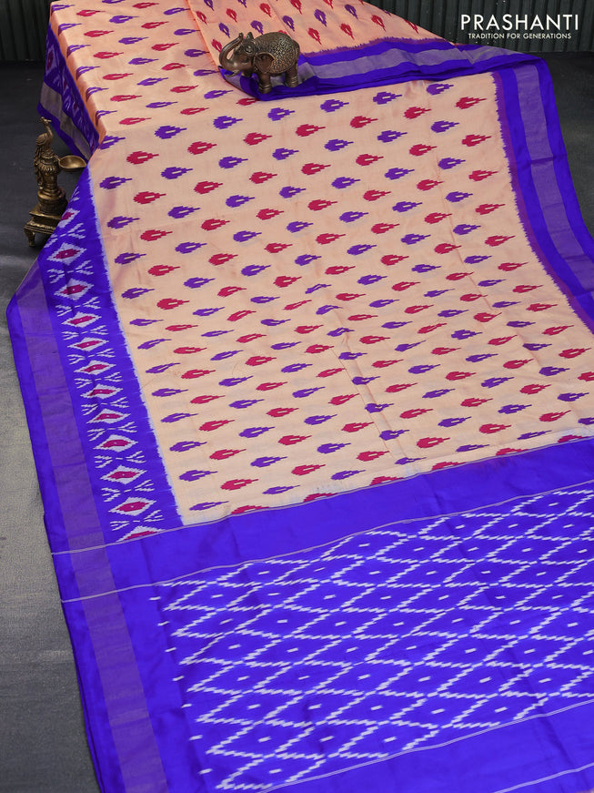 Pochampally silk saree peach shade and blue with allover ikat butta weaves and zari woven border