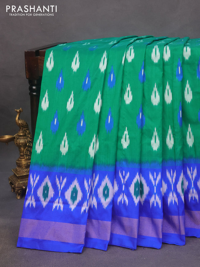 Pochampally silk saree green and royal blue with allover ikat butta weaves and zari woven border