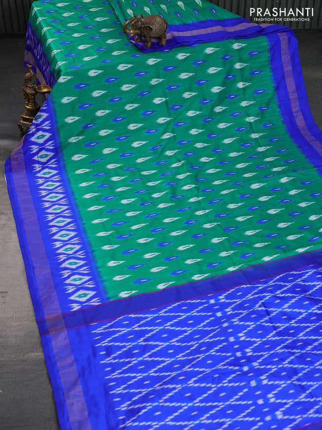 Pochampally silk saree green and royal blue with allover ikat butta weaves and zari woven border