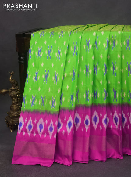 Pochampally silk saree fluorescent green and pink with allover ikat butta weaves and zari woven border