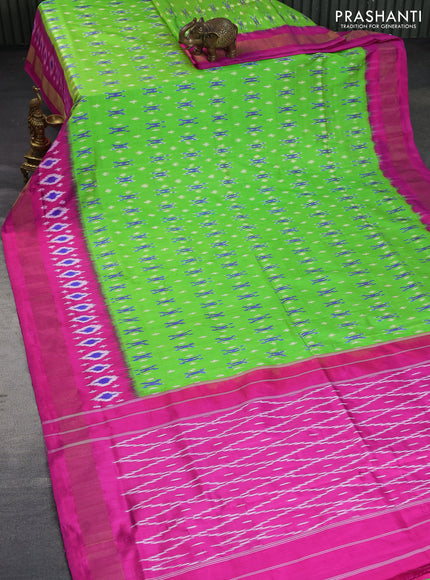 Pochampally silk saree fluorescent green and pink with allover ikat butta weaves and zari woven border