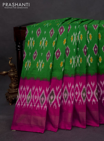 Pochampally silk saree green and pink with allover ikat butta weaves and zari woven border