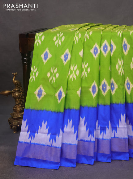 Pochampally silk saree light green and royal blue with allover ikat butta weaves and zari woven border