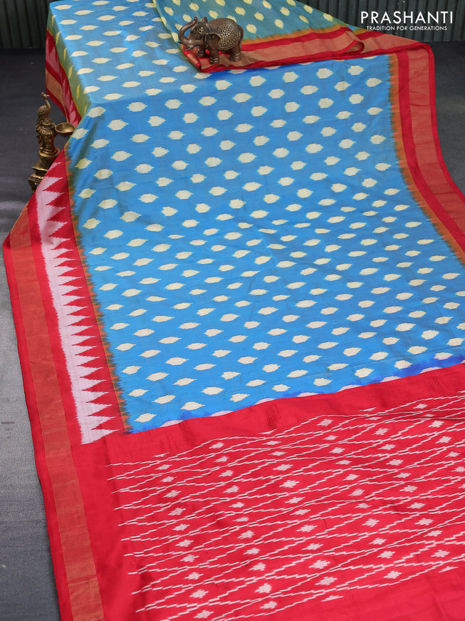 Pochampally silk saree dual shade of cs blue and red with allover ikat butta weaves and zari woven border