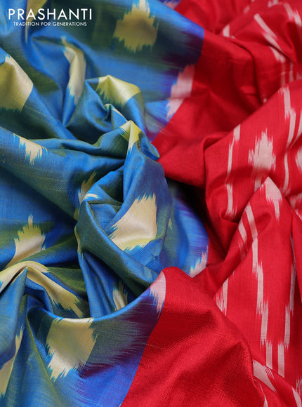 Pochampally silk saree dual shade of cs blue and red with allover ikat butta weaves and zari woven border