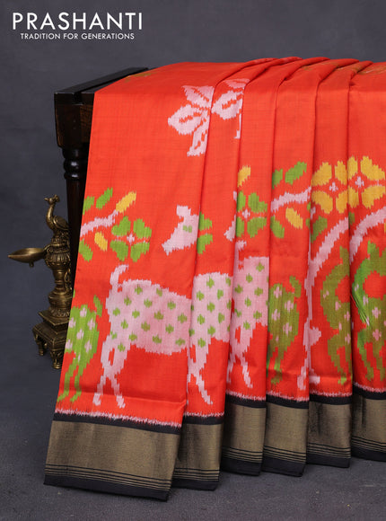 Pochampally silk saree orange and black with allover ikat buttas and zari woven border