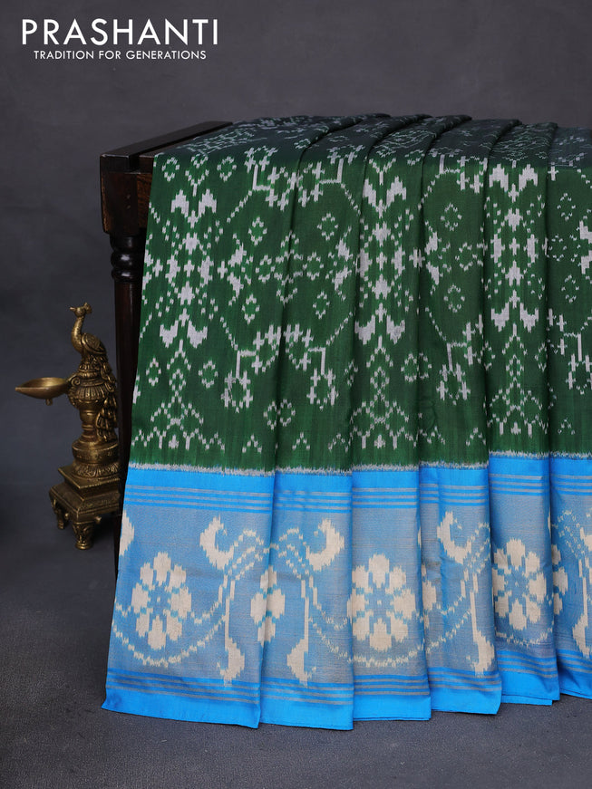 Pochampally silk saree dark green and cs blue with allover ikat weaves and long ikat woven zari border