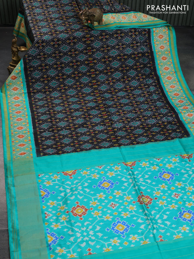 Pochampally silk saree black and teal green with allover ikat weaves and ikat woven zari border