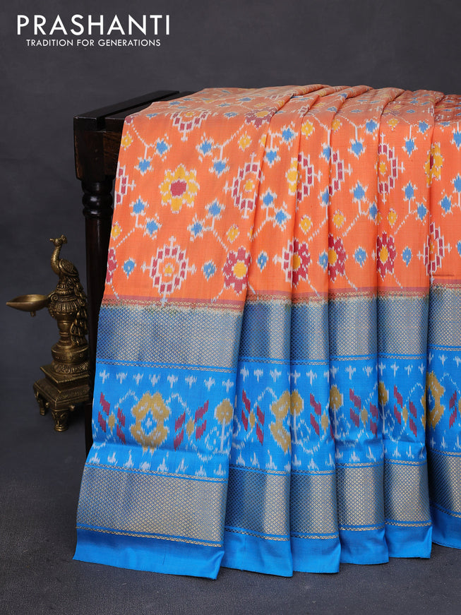 Pochampally silk saree orange and cs blue with allover ikat weaves and long zari woven ikat border