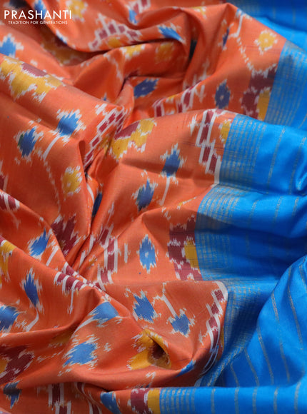 Pochampally silk saree orange and cs blue with allover ikat weaves and long zari woven ikat border