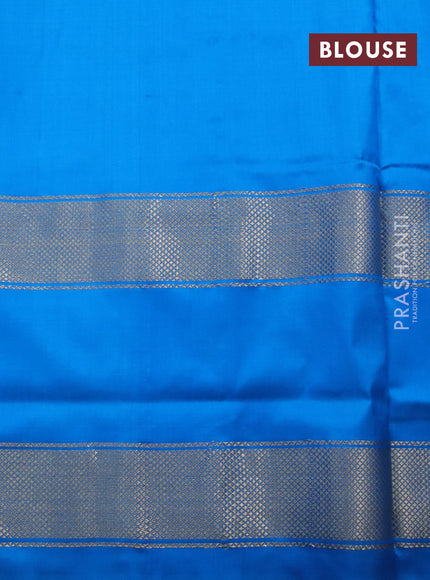 Pochampally silk saree orange and cs blue with allover ikat weaves and long zari woven ikat border