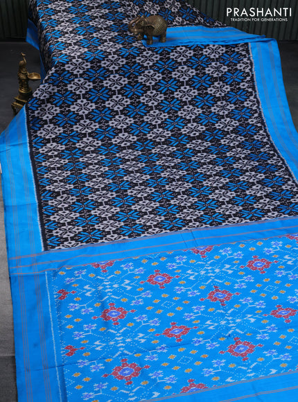 Pochampally silk saree black and cs blue with allover ikat weaves and simple rettapet border