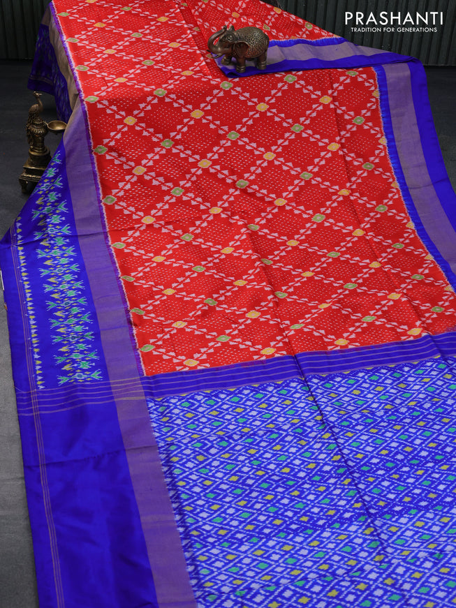 Pochampally silk saree orange and royal blue with allover ikat weaves and zari woven ikat style border