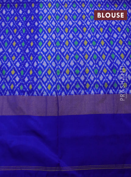 Pochampally silk saree orange and royal blue with allover ikat weaves and zari woven ikat style border