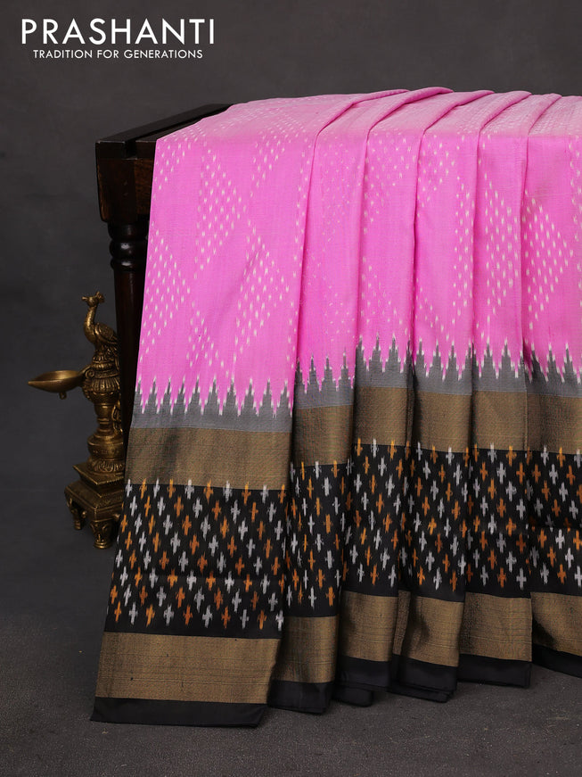 Pochampally silk saree pink and black with allover ikat weaves and long zari woven ikat style border