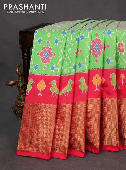 Pochampally silk saree green and red with allover ikat weaves and long ikat woven zari border