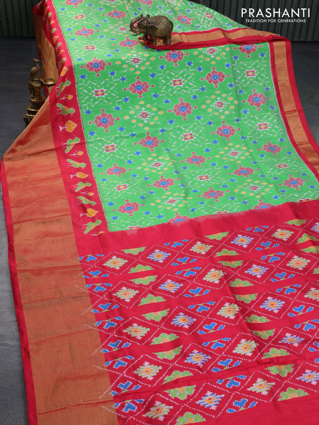 Pochampally silk saree green and red with allover ikat weaves and long ikat woven zari border