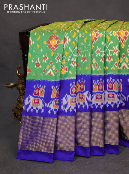 Pochampally silk saree dual shade of greenish yellow and royal blue with allover ikat weaves and long ikat woven zari border