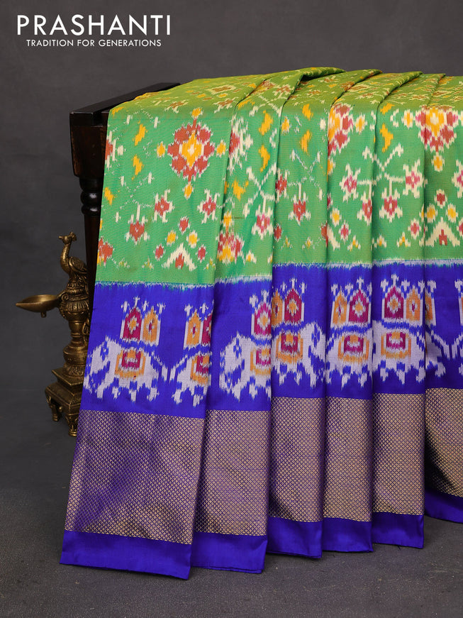 Pochampally silk saree dual shade of greenish yellow and royal blue with allover ikat weaves and long ikat woven zari border