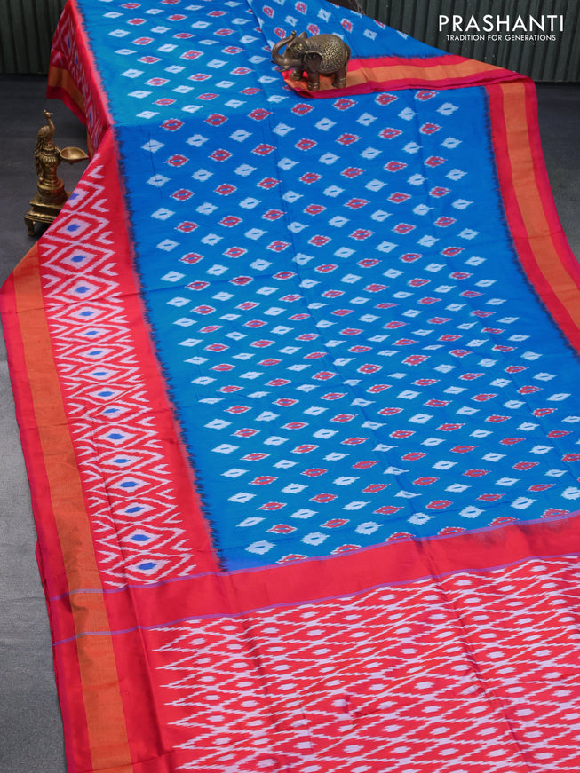 Pochampally silk saree cs blue and red with allover ikat butta weaves and long ikat woven zari border