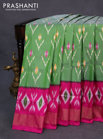 Pochampally silk saree pastel green and pink with allover ikat butta weaves and long ikat woven zari border