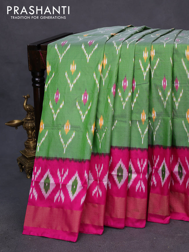 Pochampally silk saree pastel green and pink with allover ikat butta weaves and long ikat woven zari border