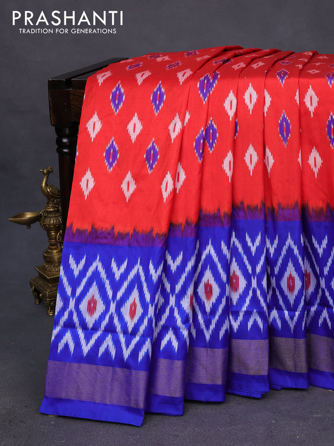 Pochampally silk saree orange and royal blue with allover ikat butta weaves and long ikat woven zari border