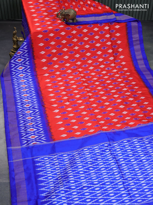 Pochampally silk saree orange and royal blue with allover ikat butta weaves and long ikat woven zari border