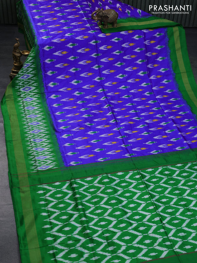 Pochampally silk saree royal blue and green with allover ikat butta weaves and long ikat woven zari border