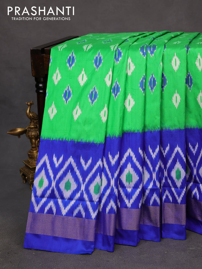 Pochampally silk saree green and royal blue with allover ikat butta weaves and long ikat woven zari border