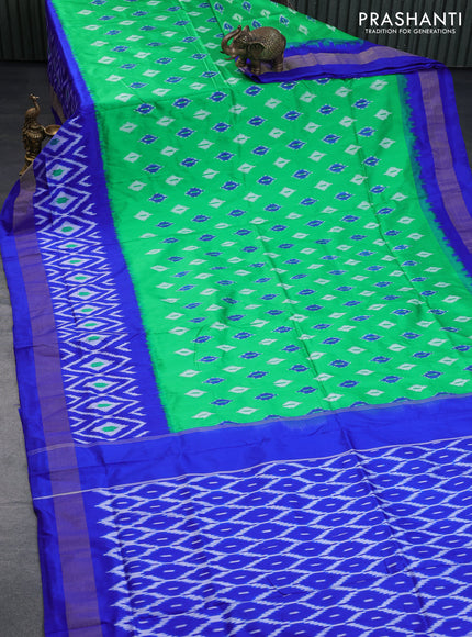 Pochampally silk saree green and royal blue with allover ikat butta weaves and long ikat woven zari border