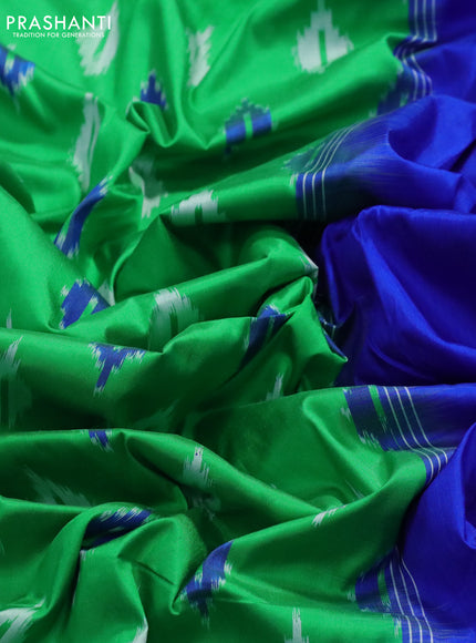 Pochampally silk saree green and royal blue with allover ikat butta weaves and long ikat woven zari border