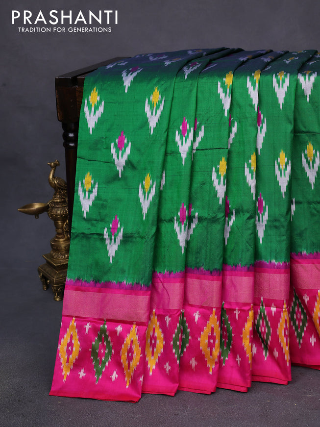 Pochampally silk saree green and pink with allover ikat butta weaves and zari woven ikat style border