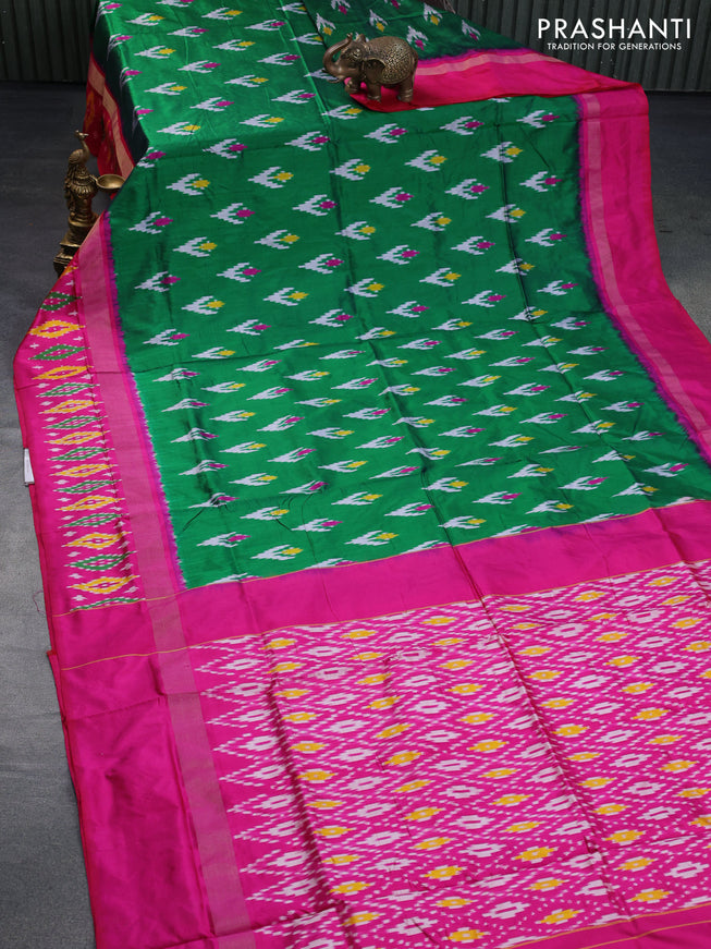 Pochampally silk saree green and pink with allover ikat butta weaves and zari woven ikat style border