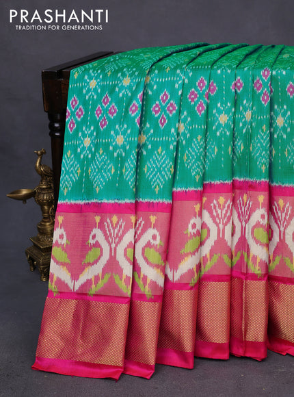 Pochampally silk saree teal blue and pink with allover ikat weaves and long ikat woven zari border