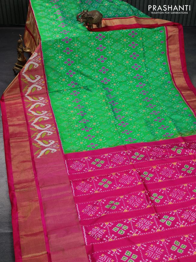 Pochampally silk saree green and reddish pink with allover ikat weaves and long ikat woven zari border